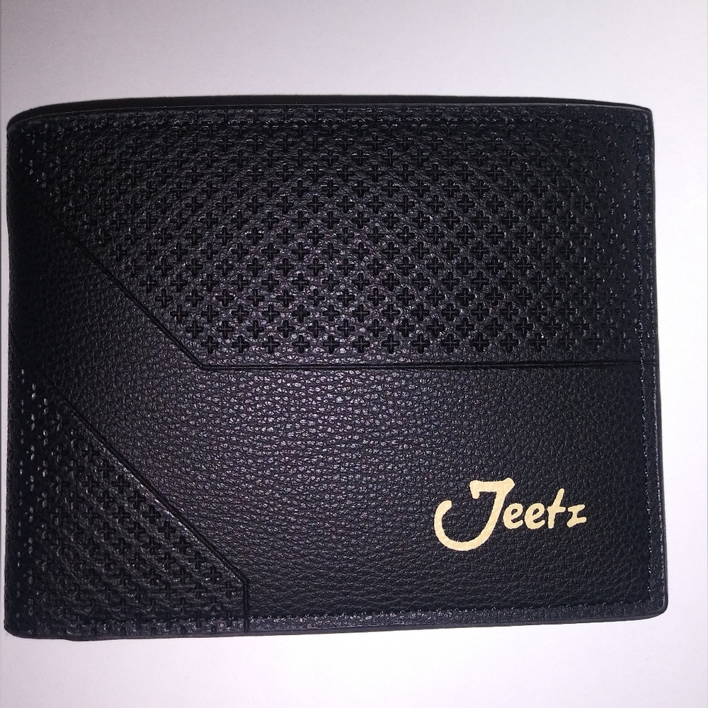 NIB Handcrafted black faux leather wallet.